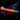 Colorful silicone dildo with ribbed shaft and gradient rainbow design on a cosmic background.