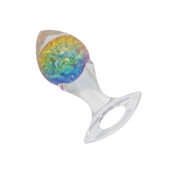 Clear silicone anal plug with embedded glittery rainbow crystal design.