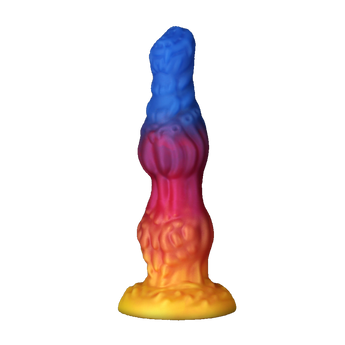Fantasy-style silicone dildo with rainbow gradient design in blue, red, and yellow, displayed on plain background.