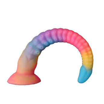 Fantasy-style silicone dildo with rainbow gradient design and suction base, displayed on plain background.